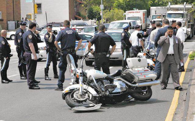 Cops in veep escort injured in collision