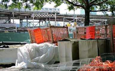 Battle brews over Queens Plaza millstones