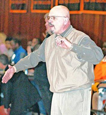 Former Queens hoops coach pleads not guilty in rape
