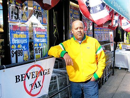 Ozone Pk. store owner stands up to guv’s money-saving proposal