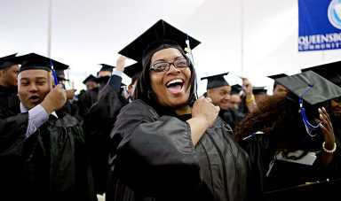 Michelle James, 44, officially becomes a 2019 Queensborough Community College graduate with a degree in office administration and technology as she moves her tassel to the left at the end of the commencement ceremony.