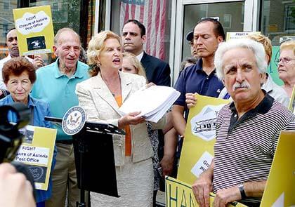 Maloney holds rally to keep open Grand Post Office