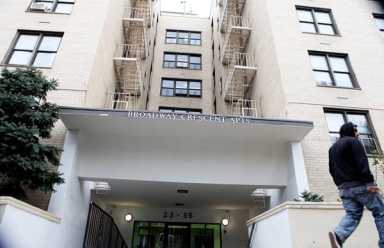 Broadway building settles suit over race