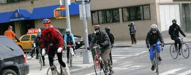 111th Precinct officers push residents to be safer on bikes