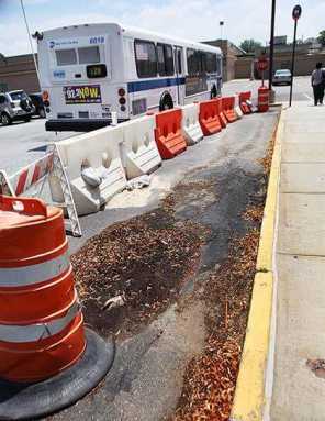 Bay Terrace owners want city to pay for bus stop fix