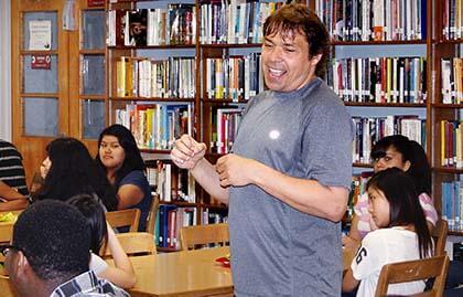 Author pays a visit to Cardozo High for talk on storytelling