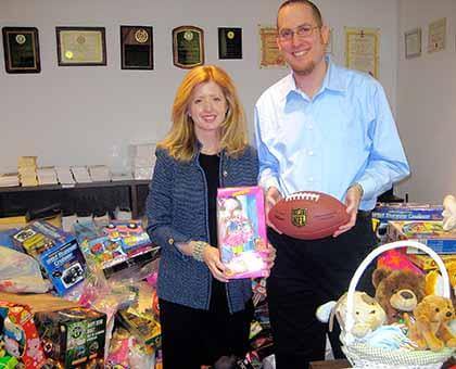 Carrozza gives out toys to kids after gift drive hits new record