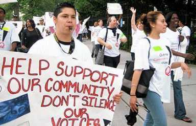 Queens Community House rallies against cuts