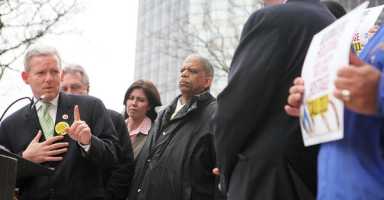 Comrie defends city schools