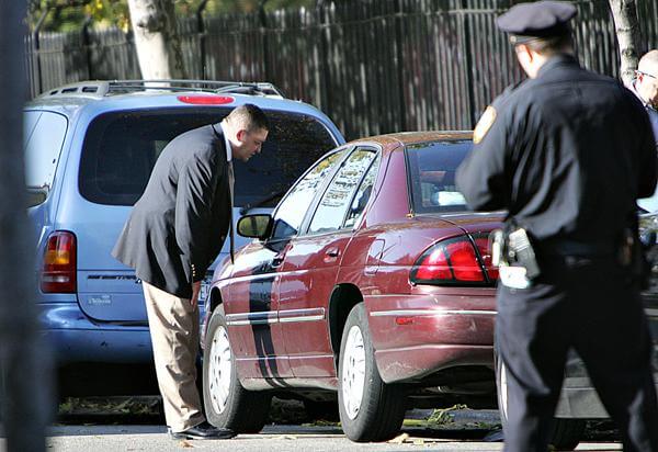 Pair found shot to death in idling car in Ridgewood