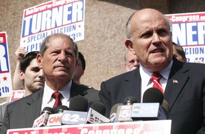 Giuliani calls Obama’s job plan ‘warm spit’ at Turner rally