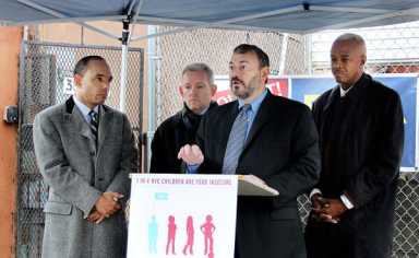 ERDA, Van Bramer give turkeys to Queensbridge