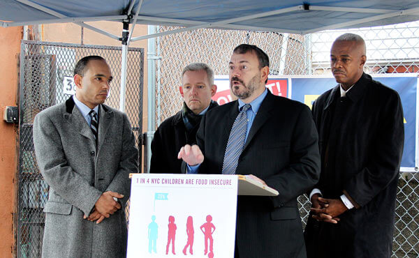 ERDA, Van Bramer give turkeys to Queensbridge