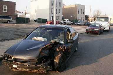 Unpopular towing company suspended from city program American Collision criticized for storing junked autos on streets while only zoned to house 5 cars