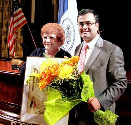 Koslowitz gives award to Cohen for boro activism