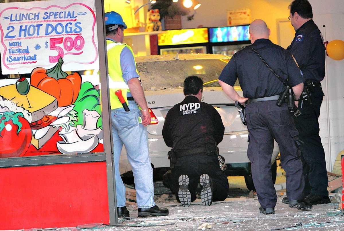 Senior rams Mercedes into Little Neck deli