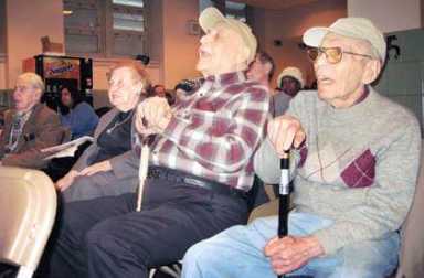 City cuts spare Queens Community House