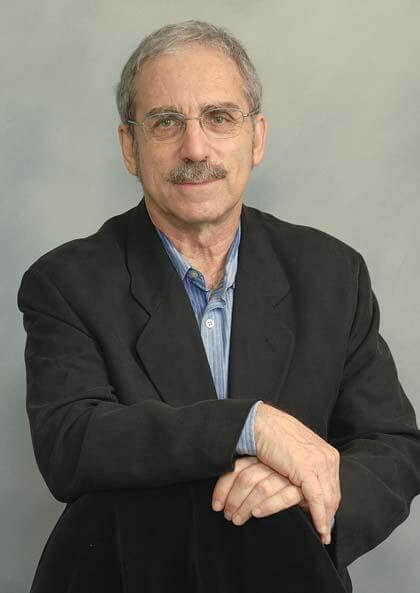 QC professor honored for race research