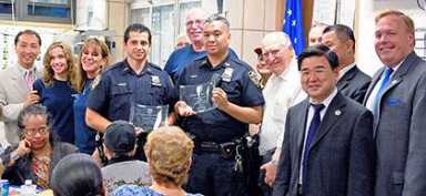Flushing officers honored for murder suspect arrest