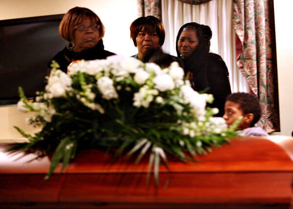 Mourners remember Q111 shooting victim