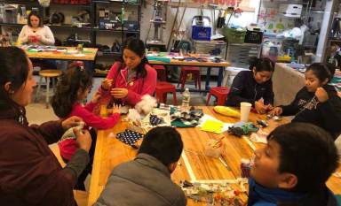 Children ‘Remake the Holidays’ with recyclable creations at New York Hall of Science