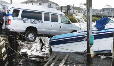 Van parks on boat after wild ride through Howard Beach