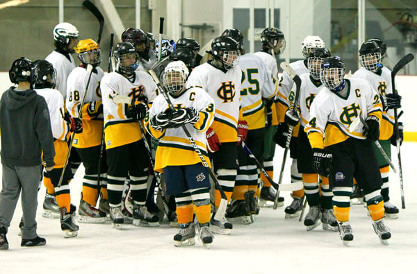 Holy Cross hockey captures third title