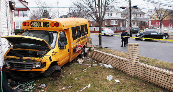 Crash sends school bus spiraling into home’s South Jamaica lawn