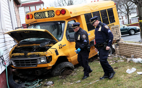 School bus ends up on lawn of South Jamaica home after crash