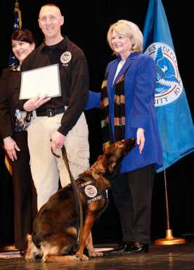 TSA agents walk many roads to college, some on four legs