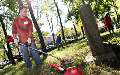 Volunteers clear debris from historic Bayside graveyard