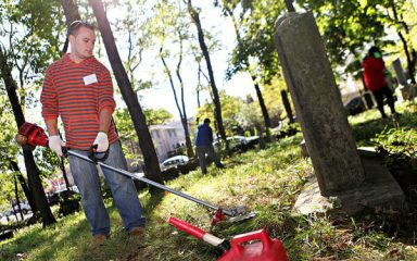 Volunteers clear debris from historic Bayside graveyard