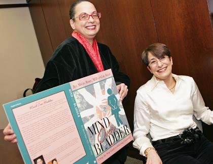 LIJ doc, patient pen book on conquering incontinence