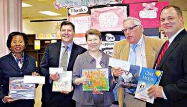 Hollis Library fund-raiser nets $10K for new materials