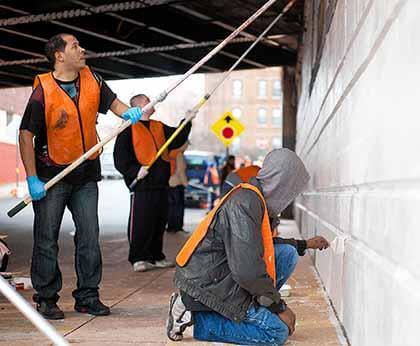 LIRR cleans graffiti on Queens bridges