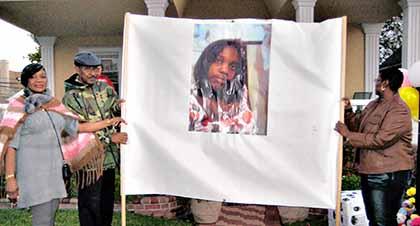 Cambria Hts family holds vigil for slain daughter