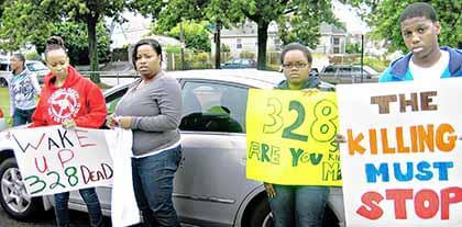Peace activists rally from Jamaica to City Hall