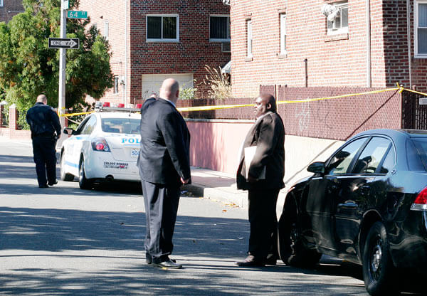 Maspeth woman still alive after shot in head