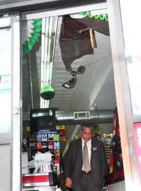 Burglar killed at Met mart