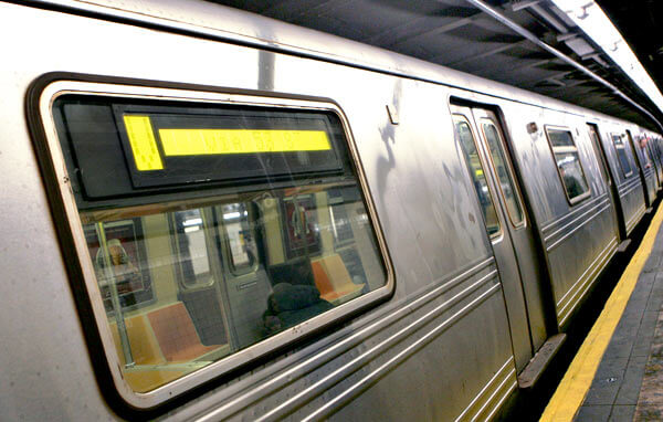 MTA OKs $12B budget, keeps service cuts