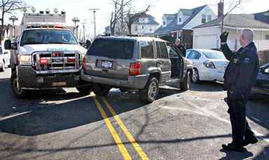 Emergency responders assist with flipped Jeep