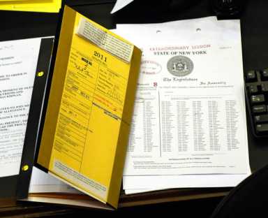 Governor signs law to cut MTA payroll tax