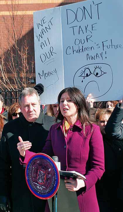 DOE slammed for taking back school savings