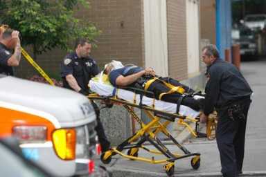 Officers shoot man wielding knife inside 109th Pct.: Police