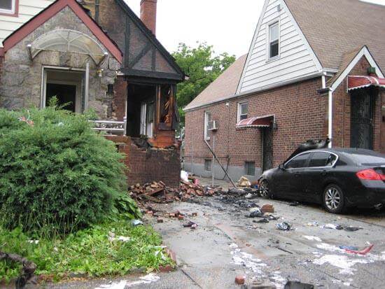 Driver dies as car sets Flushing home on fire