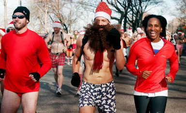 Semi-streaking Santas stroll down Ditmars for donations