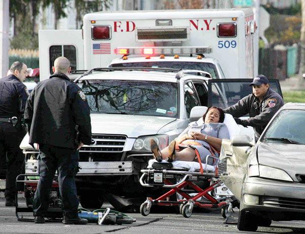 Woman checked for injuries after accident in St. Albans