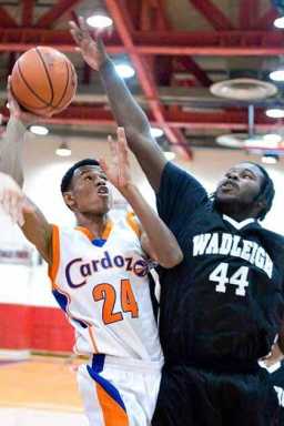 Cardozo stays perfect as Barnett downs Patterson