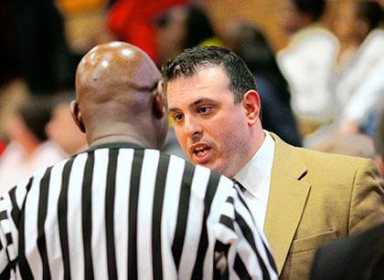 Mary Louis wins emotional semifinal for coach