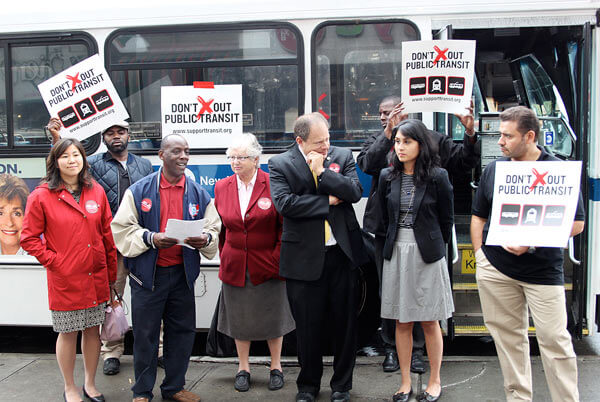 Flushing pols rally against transit cuts